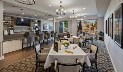 Bright dining room with tables and chairs