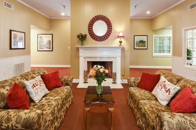 Cozy interior lounge area with floral couches