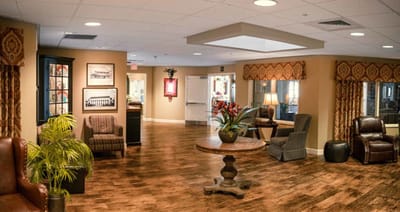 Bright lounge area with seating and decor