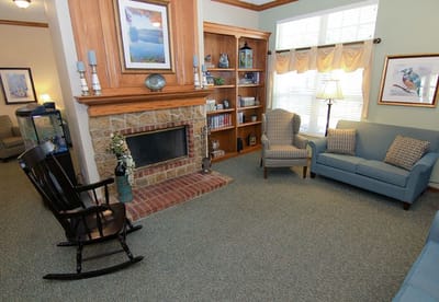Cozy common area with seating and a fireplace