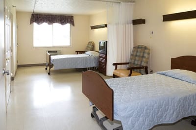 Interior view of a shared resident room with two beds