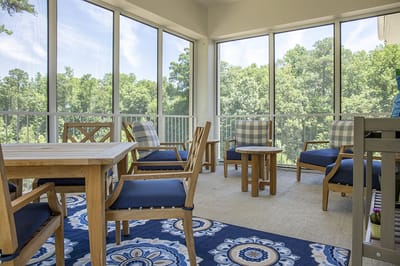 Bright common area with seating and a view