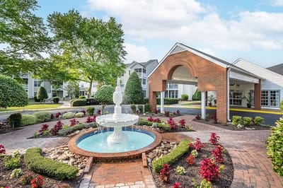 Exterior view of a well landscaped assisted living facility
