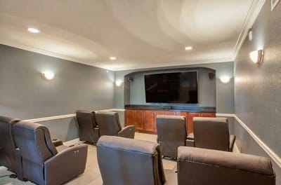 Brightly lit movie theater with seating