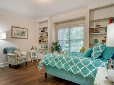 Cozy private resident room with turquoise decor