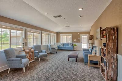 Bright common area with seating and natural light