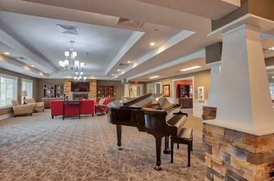 Interior view of a common area with piano