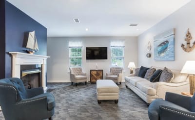Cozy common area with seating and nautical decor