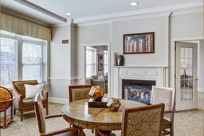 Cozy common area with seating and a fireplace