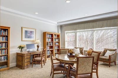 Cozy library space with books and seating