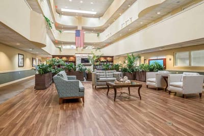 Interior view of a bright common area with seating