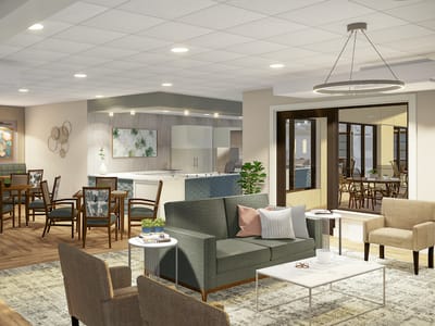 Bright common area with seating and dining space