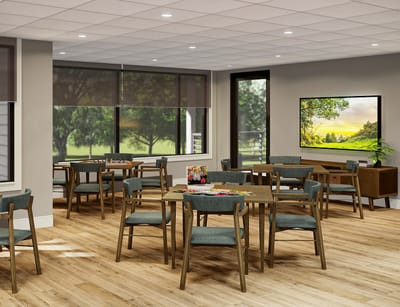 Bright common area with tables and chairs