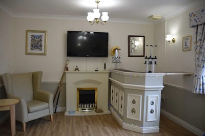Interior view of a lounge area with a bar
