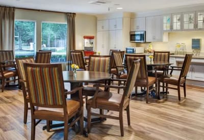Dining area with tables and chairs in a common space