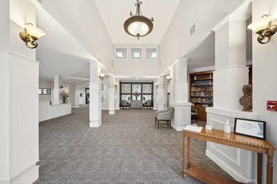 Bright lobby area with seating and a welcoming atmosphere