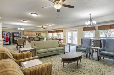 Interior common area with seating and kitchen