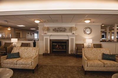 Cozy common area with elegant seating and fireplace