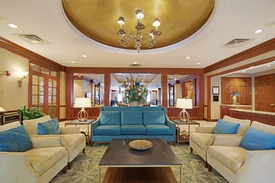 Interior view of a cozy common area with seating