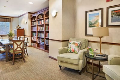 Cozy common area with bookshelves and seating