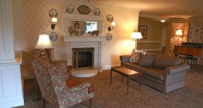 Cozy common area with seating and fireplace