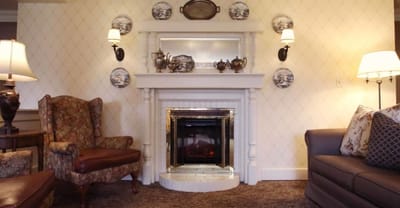 Cozy common area with seating and fireplace