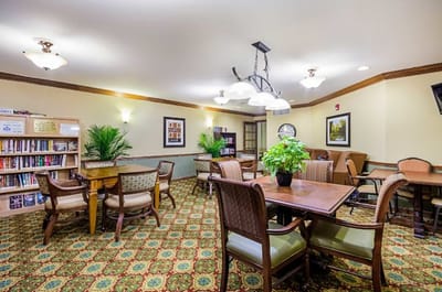 Common area with seating and bookshelves