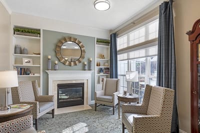 Cozy common area with comfortable seating and fireplace