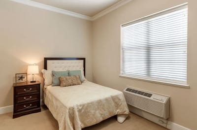 Cozy private bedroom with light decor