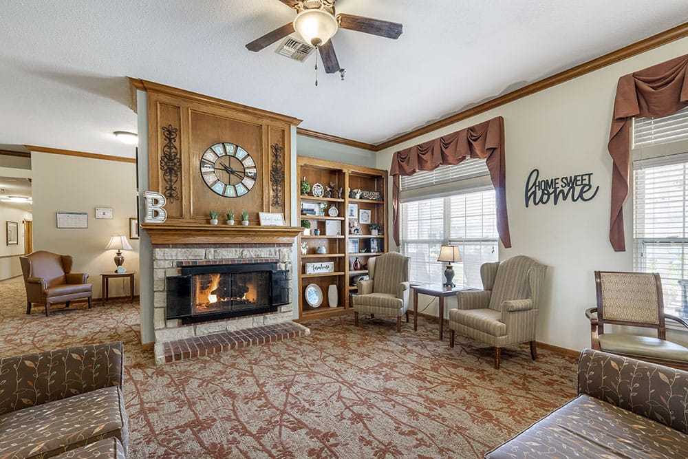 Cozy common area with seating and a fireplace