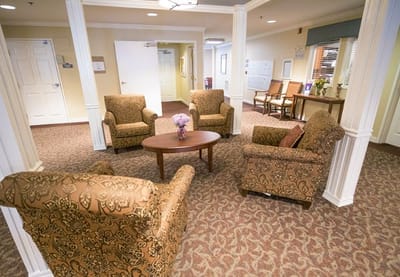Cozy common area with chairs and a table