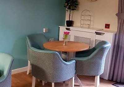 Cozy seating area with chairs and a table