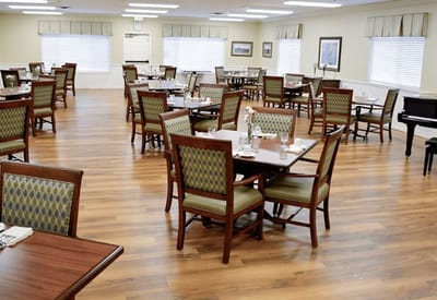 Dining area with tables and chairs neatly arranged