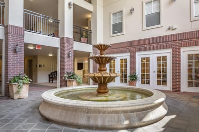 Indoor common area featuring a decorative fountain