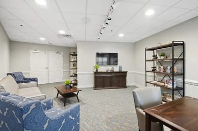 Bright common area with comfortable seating and decor