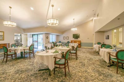 Interior view of a dining room with tables and decor