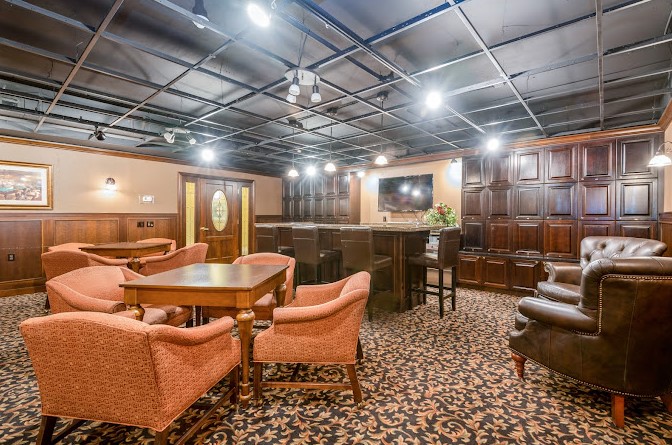 Common area lounge with seating and bar space