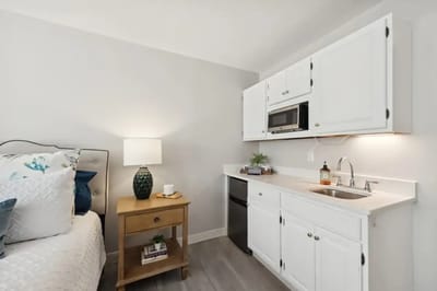 Cozy interior view of a resident room with kitchenette