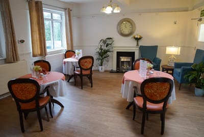 Cozy dining room with decorated tables and chairs