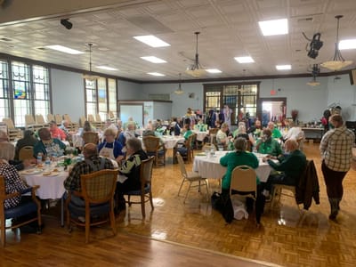 Residents enjoying a meal in a common dining area