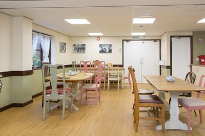 Dining area with colorful chairs and tables