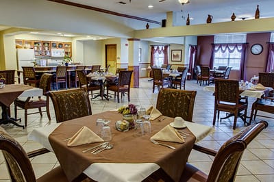 Dining area with tables set for a meal