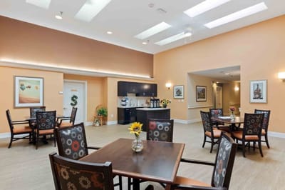 Bright common area with tables and chairs