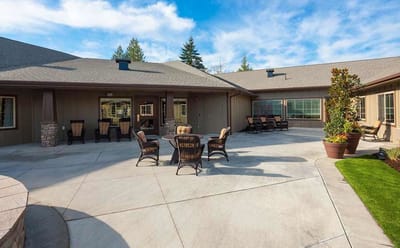 Outdoor patio area with seating for residents