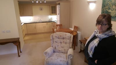 A cozy senior living apartment with a resident.