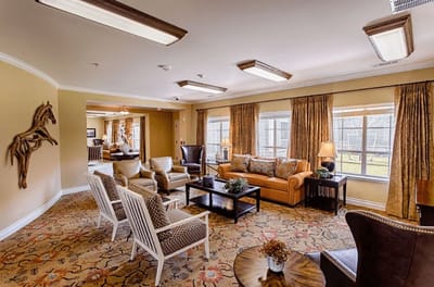 Bright common area with seating and natural light