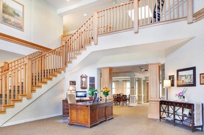 Welcoming lobby area with reception desk and seating
