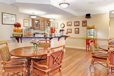 Bright dining area with tables and refreshments