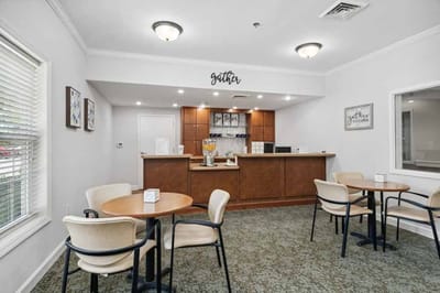 Bright common area with a gathering space and seating
