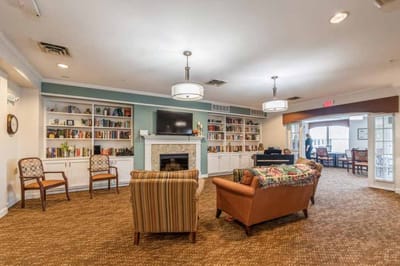 Common area with bookshelves and seating